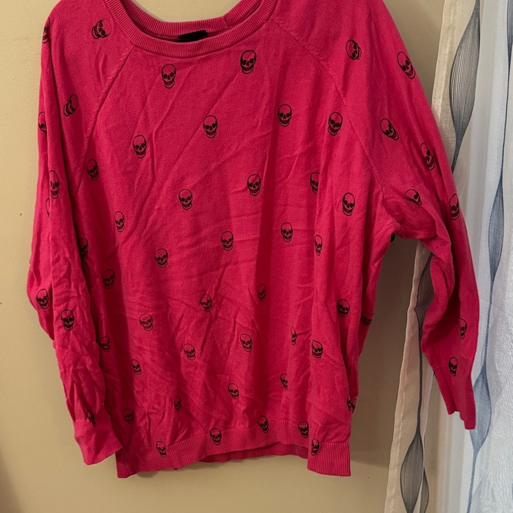 Torrid Pink Sweater with Black Skull Design